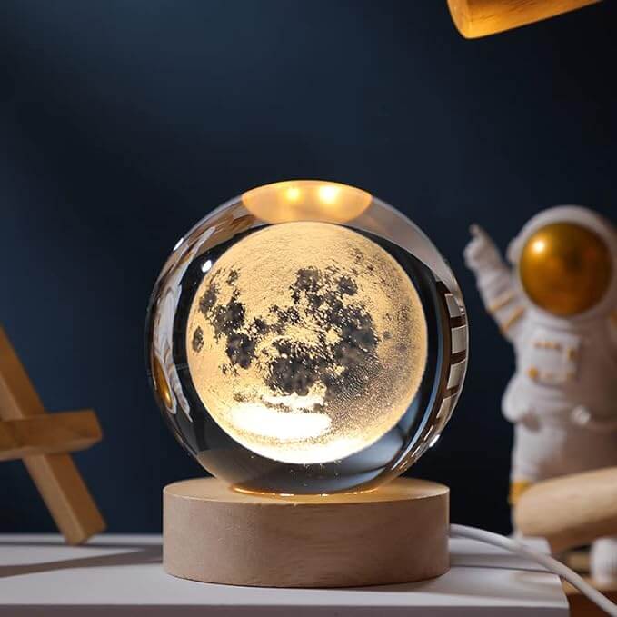 Galaxy Crystal Ball Night Light illuminating a room with a detailed 3D moon design, perfect night light for kids.