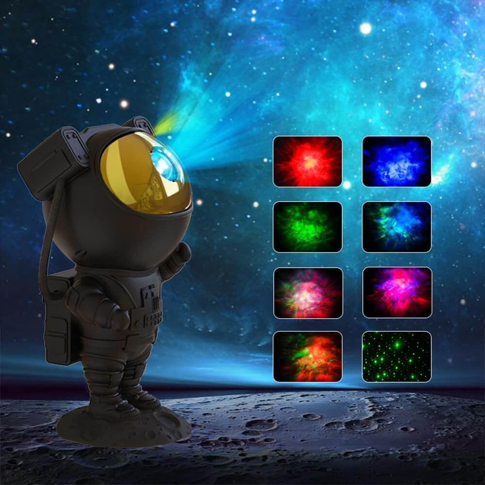 Astronaut galaxy projector emitting starry nebula LED light with various color projections in the background