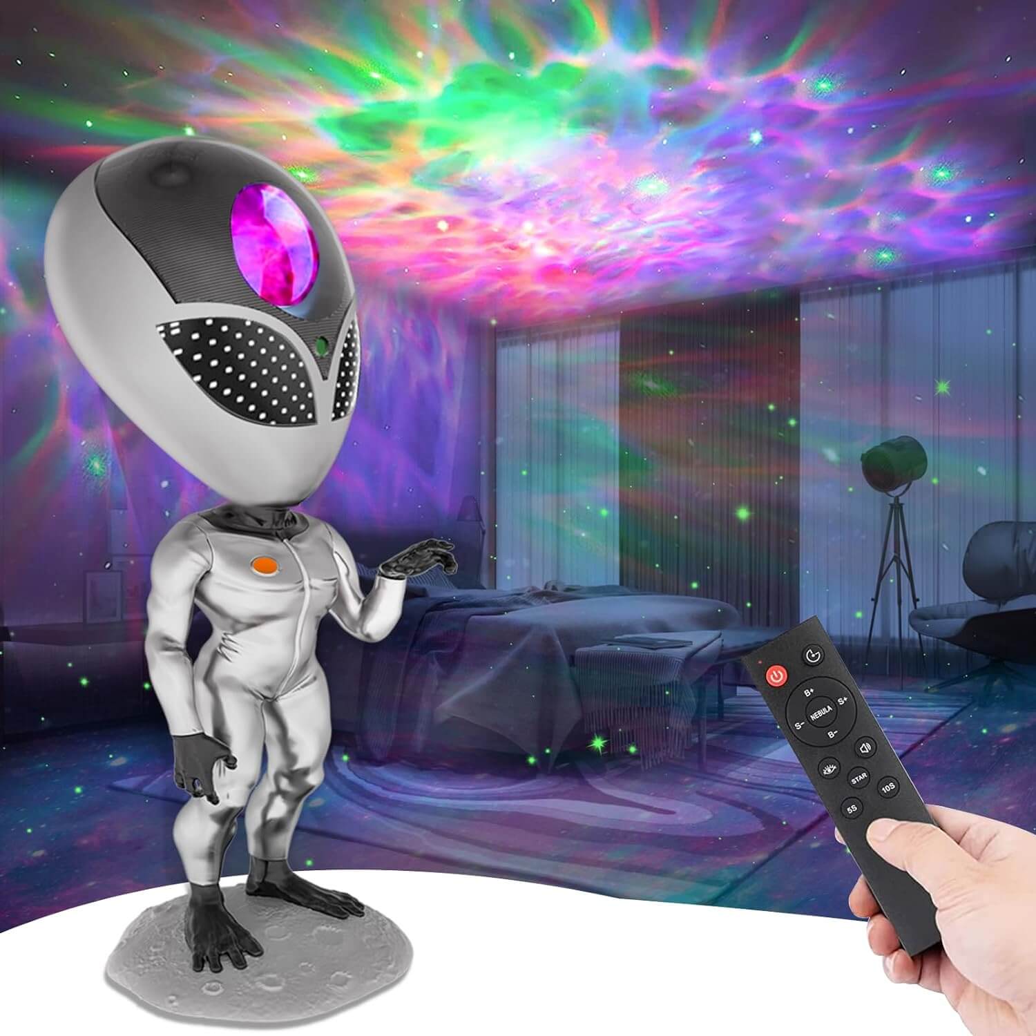 Aliens Galaxy Projector illuminating a bedroom with colorful nebula effects and twinkling green stars, remote control in hand.