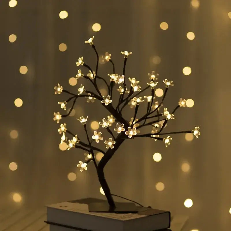 Sakura Flower Lamp with glowing cherry blossom design and flexible branches, illuminating a room with elegant and serene lighting.